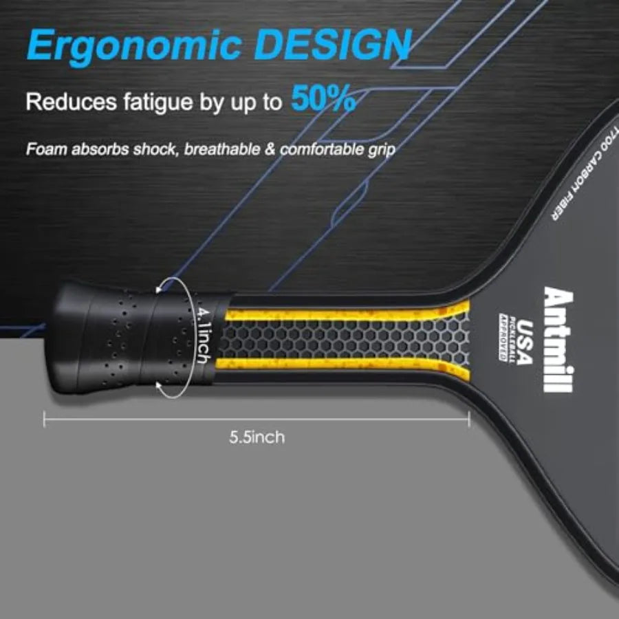 A close-up of a pickleball paddle grip and paddle face with marketing text. The grip is black with a yellow honeycomb pattern and white Antmill branding.