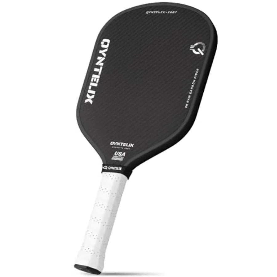 Black pickleball paddle with white handle on a white background