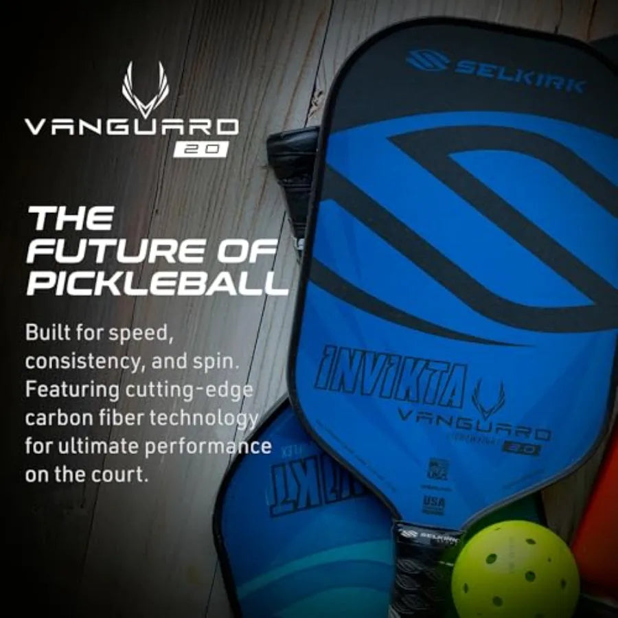Blue and black Selkirk Invicta Vanguard 2.0 pickleball paddle shown on a wood surface with a yellow pickleball and promotional text about pickleball performance.