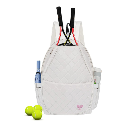 A white quilted tennis backpack with dual shoulder straps, shown on a white background with tennis balls, a closed blue umbrella, and tennis rackets in its pockets.